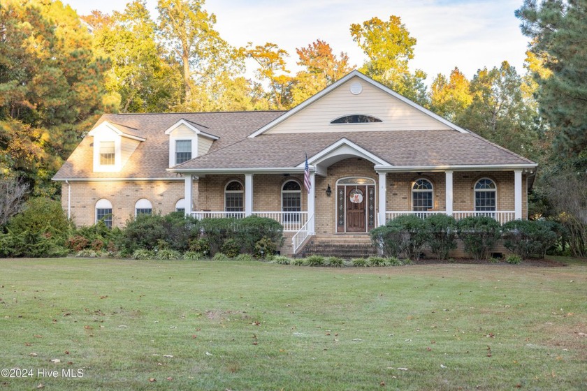 This stunning custom-built 4-bedroom, 3.5-bath home is set on a - Beach Home for sale in Hertford, North Carolina on Beachhouse.com