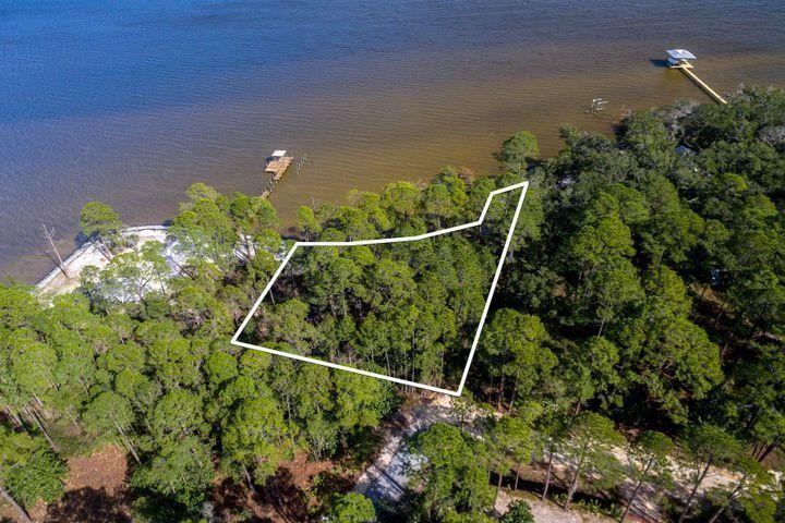 Don't miss out on the opportunity to own this expansive Bay - Beach Lot for sale in Santa Rosa Beach, Florida on Beachhouse.com