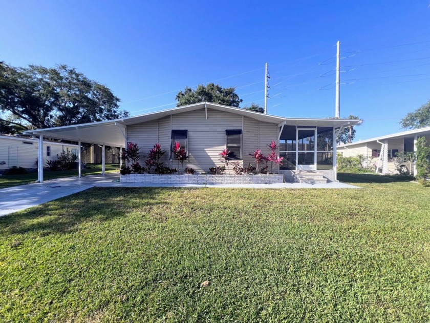 Welcome to this serene and secure 55 Plus gated and guarded - Beach Home for sale in Sarasota, Florida on Beachhouse.com