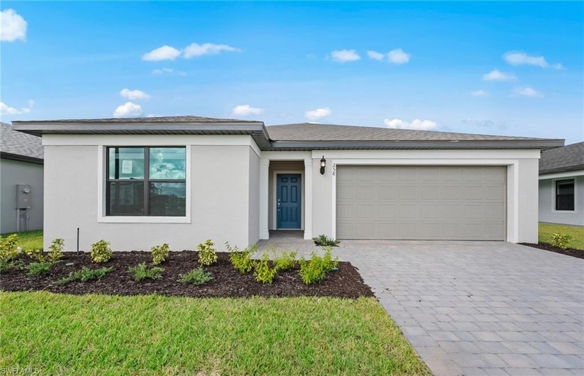 BRAND NEW CONSTRUCTION-MOVE IN READY NOW with impact windows and - Beach Home for sale in Lehigh Acres, Florida on Beachhouse.com