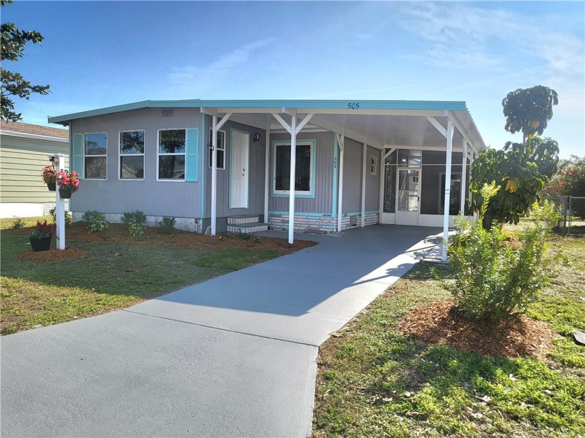 The updated cottage is a charming, cozy retreat nestled in - Beach Home for sale in Barefoot Bay, Florida on Beachhouse.com