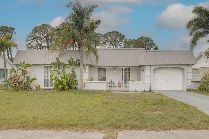 Welcome home to this fabulous, well-loved and maintained pool - Beach Home for sale in Holiday, Florida on Beachhouse.com