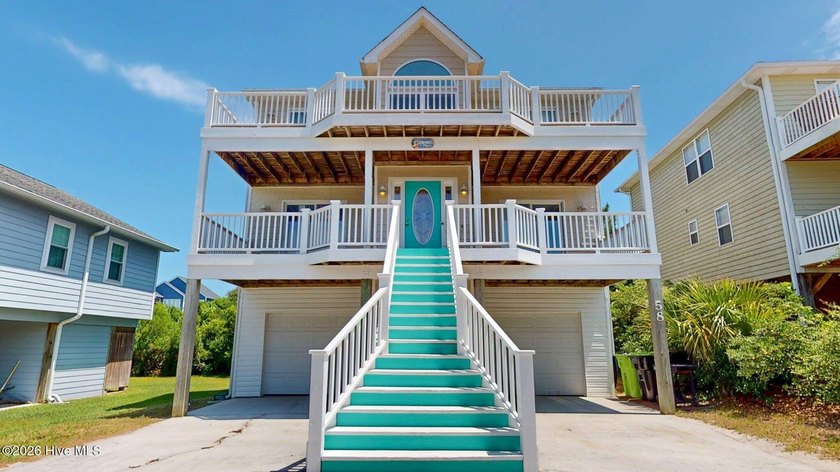 Offering a sunny and bright 4 bedroom, 3.5 bath beach home with - Beach Home for sale in Surf City, North Carolina on Beachhouse.com