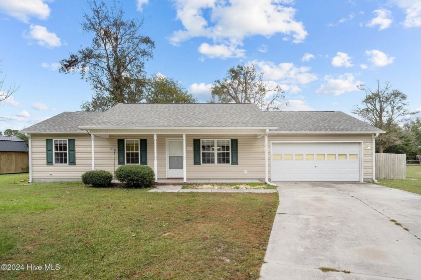 Discover rustic charm in this inviting 3-bedroom, 2-bath home - Beach Home for sale in Sneads Ferry, North Carolina on Beachhouse.com