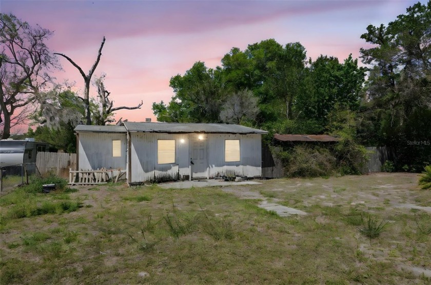 This charming two-bedroom, one-bathroom home sits on a .27-acre - Beach Home for sale in Weeki Wachee, Florida on Beachhouse.com