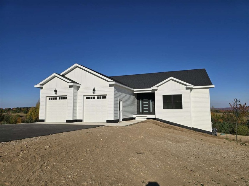 Welcome to 358 Harbor View Ln in Petoskey, MI, where modern - Beach Home for sale in Petoskey, Michigan on Beachhouse.com