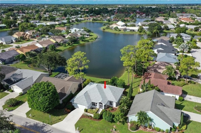 SPECTACULAR LAKE VIEW & ROOF IS BARELY TWO YEARS OLD!! This - Beach Home for sale in Naples, Florida on Beachhouse.com