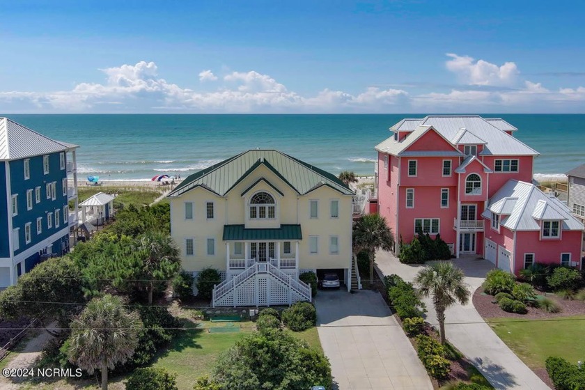 Experience the allure of oceanfront living! This stunning home - Beach Home for sale in Emerald Isle, North Carolina on Beachhouse.com