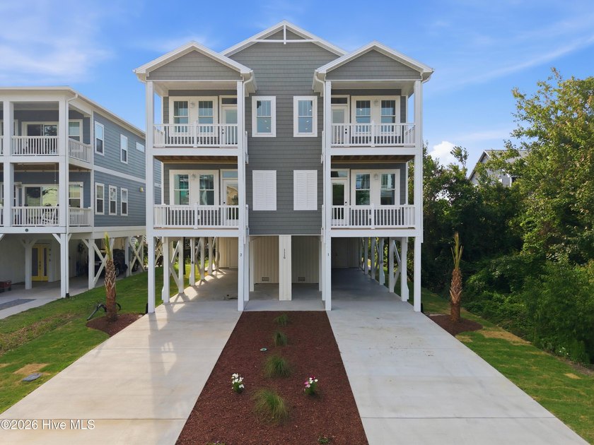 Just three blocks from the beach, this stunning new construction - Beach Townhome/Townhouse for sale in Carolina Beach, North Carolina on Beachhouse.com
