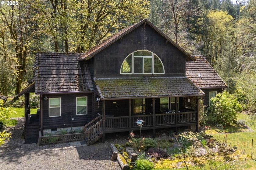 Ideally located on the picturesque Wilson River, this quality - Beach Home for sale in Tillamook, Oregon on Beachhouse.com