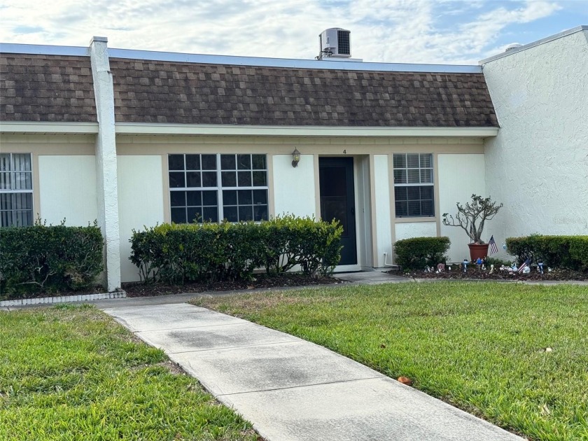 Welcome home to Timber Oaks Fairway Villas, a beautifully - Beach Condo for sale in Port Richey, Florida on Beachhouse.com