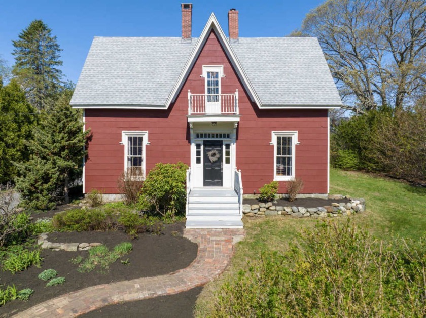 This Gothic Revival sits back from the street on an oversized - Beach Home for sale in South Portland, Maine on Beachhouse.com