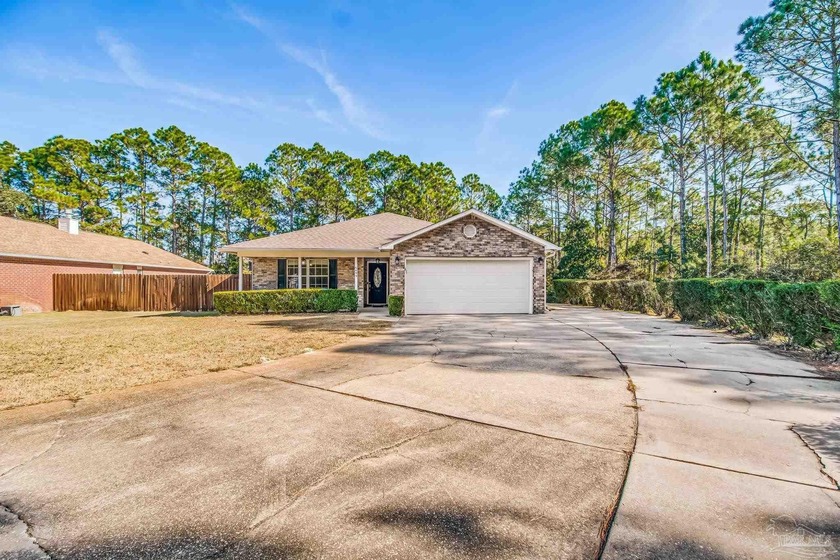 Tucked away at the end of a quiet cul-de-sac in the Hidden - Beach Home for sale in Gulf Breeze, Florida on Beachhouse.com