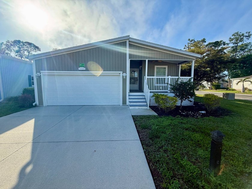 This beautiful 2-bedroom, 2-bathroom home with flex room is - Beach Home for sale in North Fort Myers, Florida on Beachhouse.com