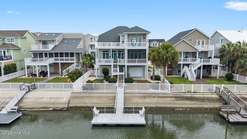 Experience coastal luxury in this beautifully furnished Ocean - Beach Home for sale in Ocean Isle Beach, North Carolina on Beachhouse.com