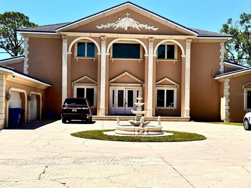 Diamond in the rough! A rare find! Traditional, stately mansion - Beach Home for sale in Dunedin, Florida on Beachhouse.com