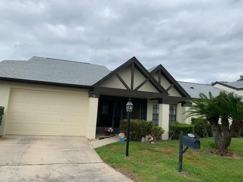 BEAUTIFUL NEW FRONT DOORS, FORMAL LIVING ROOM, DINING ROOM - Beach Home for sale in Palm Harbor, Florida on Beachhouse.com