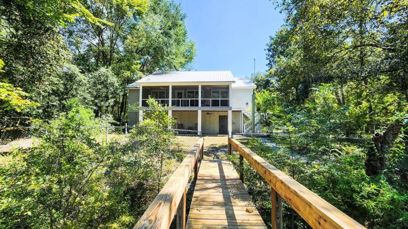 Ochlockonee Riverfront Retreat with Artesian Well & Private Dock - Beach Home for sale in Sopchoppy, Florida on Beachhouse.com