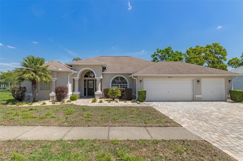 This stunning and elegant home features three bedrooms and two - Beach Home for sale in Spring Hill, Florida on Beachhouse.com