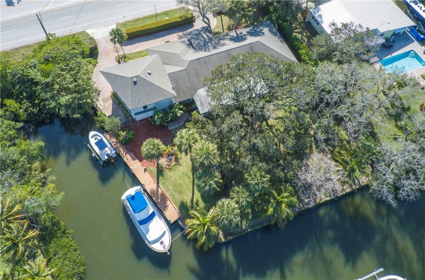 This remarkable home is on a deep water canal with water on both - Beach Home for sale in Vero Beach, Florida on Beachhouse.com