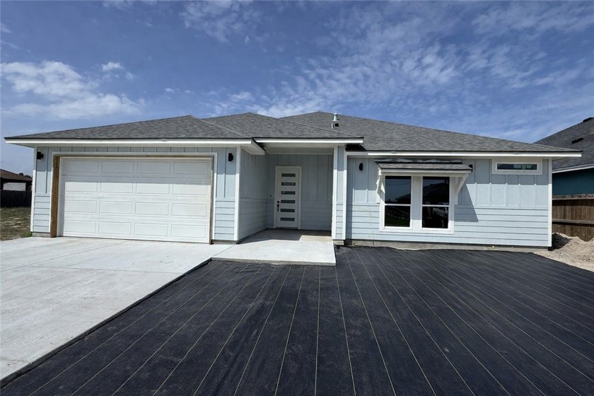 Escape to your brand-new coastal-style contemporary Island - Beach Home for sale in Corpus Christi, Texas on Beachhouse.com