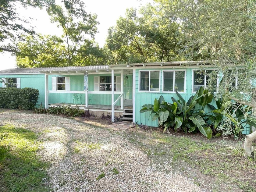 This adorable *Mermaid* home is located on a corner lot not far - Beach Home for sale in Carabelle, Florida on Beachhouse.com