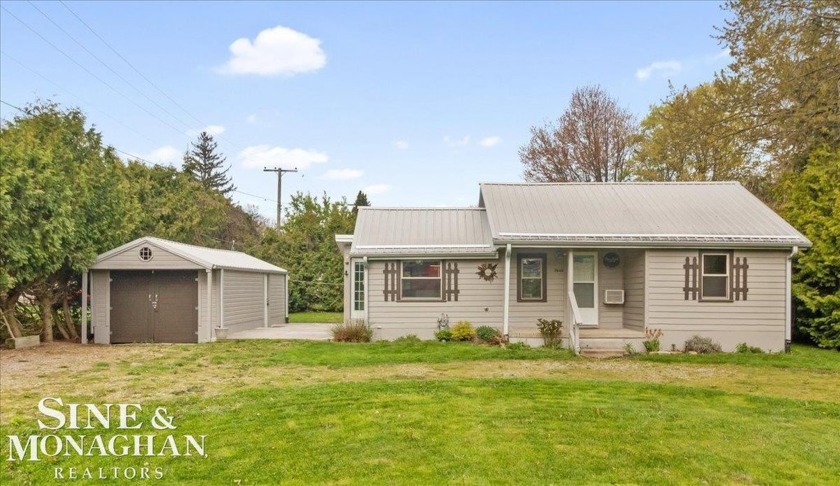 Charming 2-Bedroom Cottage with Loft in the Heart of Lexington - Beach Home for sale in Lexington, Michigan on Beachhouse.com