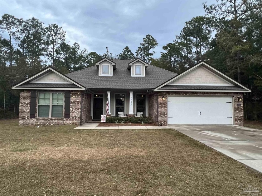 This is a well Built and gorgeous 4-bedroom, 2-bath split-level - Beach Home for sale in Milton, Florida on Beachhouse.com