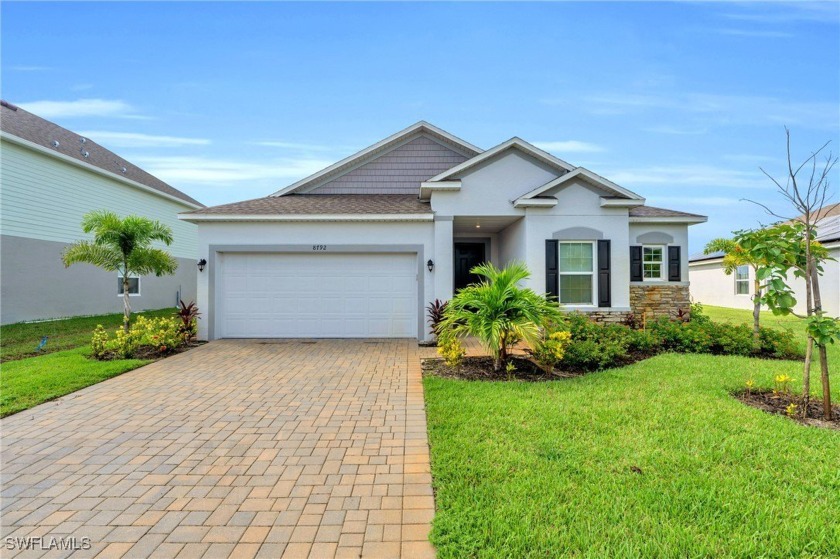 Nestled in the family-friendly gated community of Brightwater -- - Beach Home for sale in North Fort Myers, Florida on Beachhouse.com