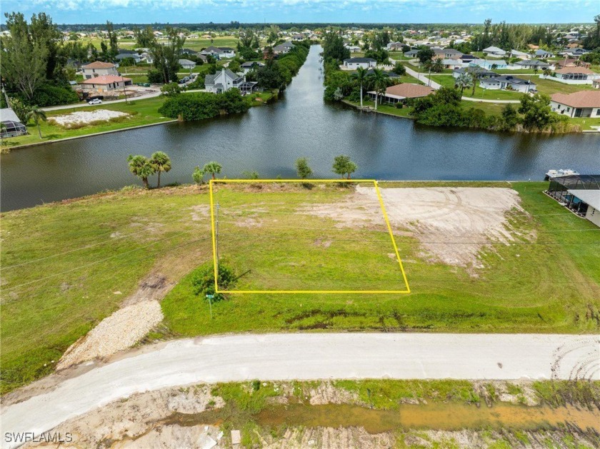 Nestled on a lot along a freshwater canal, this prime location - Beach Lot for sale in Cape Coral, Florida on Beachhouse.com