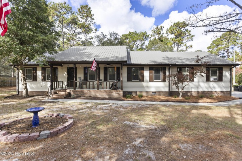 This spacious 3 bedroom, 2 bath home is located on a .48 acre - Beach Home for sale in Southport, North Carolina on Beachhouse.com