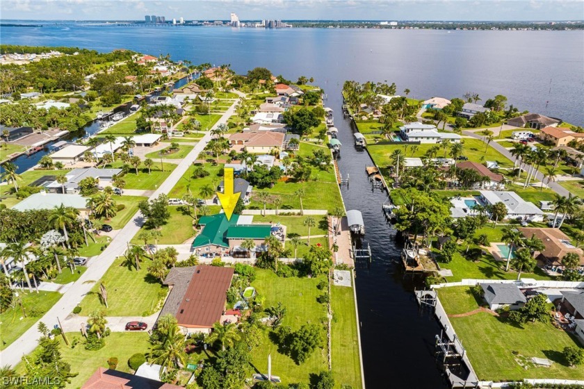 Completely renovated Gulf access pool home offers the coveted - Beach Home for sale in North Fort Myers, Florida on Beachhouse.com