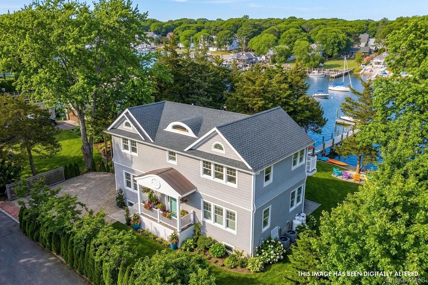 This newly constructed, post-modern waterfront home offers a - Beach Home for sale in Aquebogue, New York on Beachhouse.com
