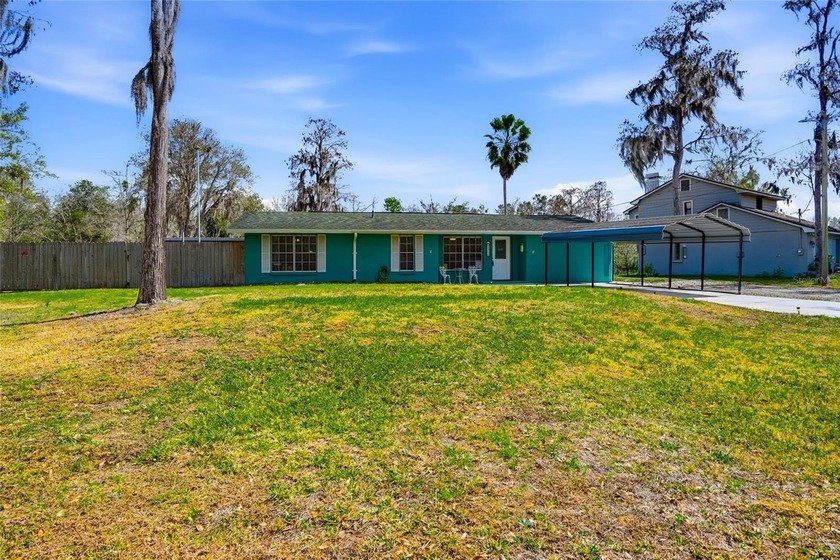 Welcome home to this charming 3-bedroom, 2-bath residence set on - Beach Home for sale in Land O Lakes, Florida on Beachhouse.com