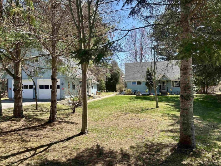 Welcome to this beautifully maintained 3-bedroom, 1.5-bath Cape - Beach Home for sale in Manistique, Michigan on Beachhouse.com