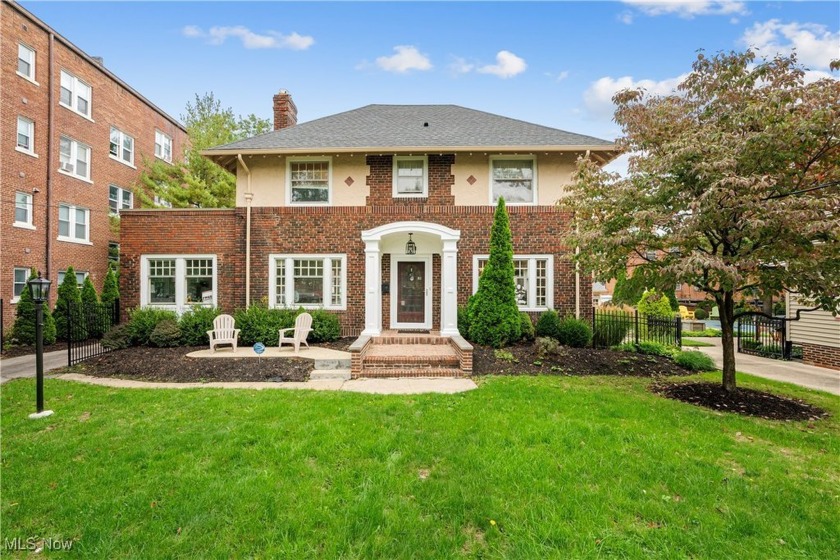 Welcome to this Beautiful Brick Front Colonial that boasts the - Beach Home for sale in Lakewood, Ohio on Beachhouse.com