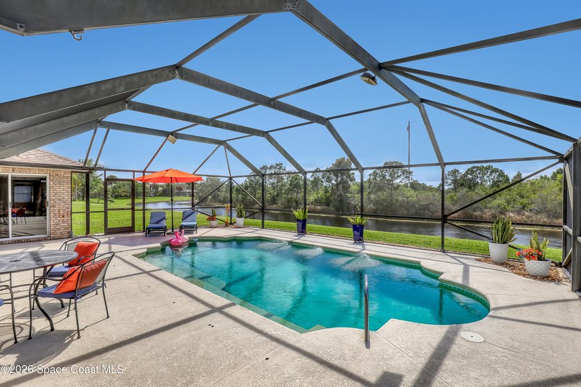 Welcome to this charming 4-bedroom, 2.5-bath pool home with a - Beach Home for sale in Melbourne, Florida on Beachhouse.com
