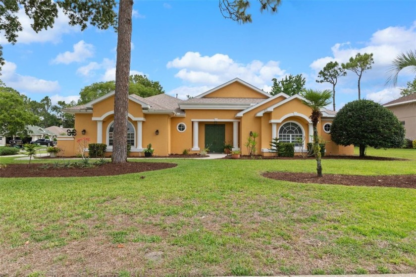 Stunning Custom-Built Palmwood Courtyard Home Nestled In The - Beach Home for sale in Spring Hill, Florida on Beachhouse.com
