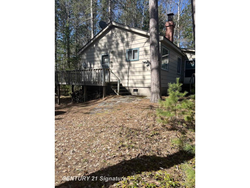 Lake Superior Cottage with 88 Feet of Sandy Beachfront Nestled - Beach Home for sale in Marquette, Michigan on Beachhouse.com