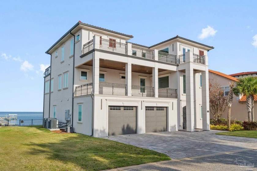Stunning custom waterfront residence on Pensacola Bay featuring - Beach Home for sale in Gulf Breeze, Florida on Beachhouse.com