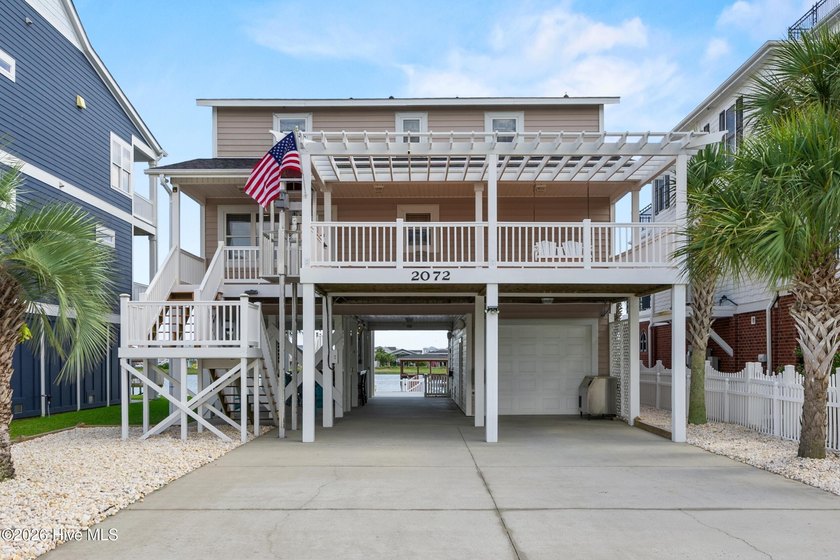 Experience coastal living at its finest at 2072 W Sea Aire Canal - Beach Home for sale in Supply, North Carolina on Beachhouse.com