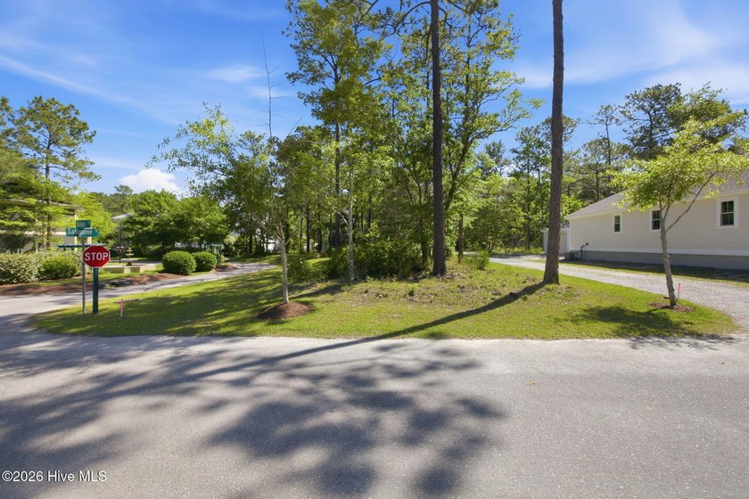 Build your dream home in the charming Village of Woodsong! This - Beach Lot for sale in Shallotte, North Carolina on Beachhouse.com