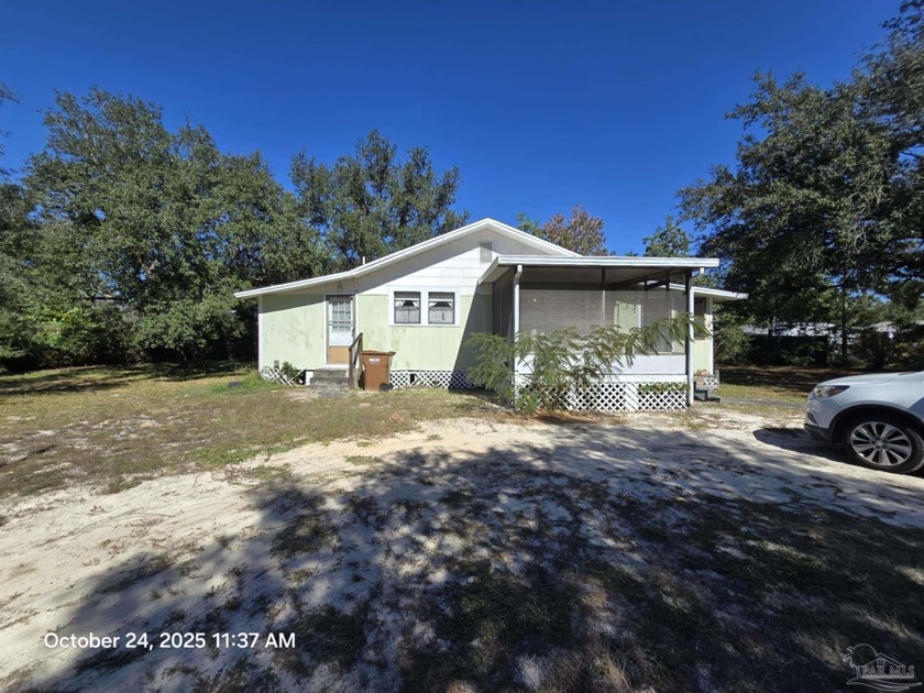 Investor special.   The home needs a lot of TLC to bring it back - Beach Home for sale in Navarre, Florida on Beachhouse.com