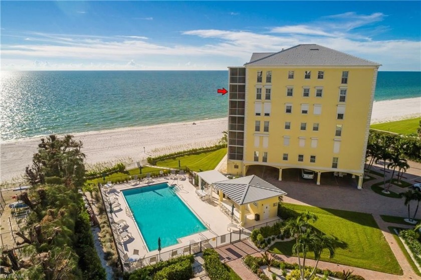 Welcome home to this luxurious beachfront end condominium - Beach Condo for sale in Naples, Florida on Beachhouse.com