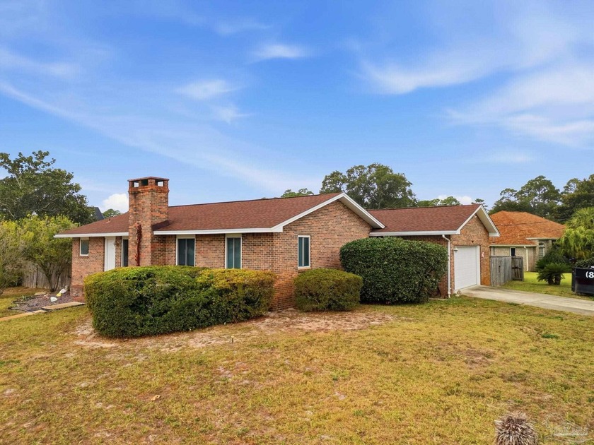 This ADORABLE 2 bedroom, 2 bathroom, brick home is nestled on a - Beach Home for sale in Navarre, Florida on Beachhouse.com