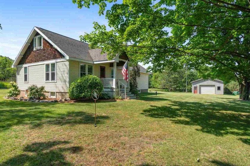 Charming Charlevoix South Side Bungalow next to Lake Charlevoix - Beach Home for sale in Charlevoix, Michigan on Beachhouse.com