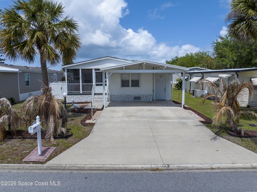 Welcome to Florida Living. Situated within the Barefoot Bay - Beach Home for sale in Barefoot Bay, Florida on Beachhouse.com