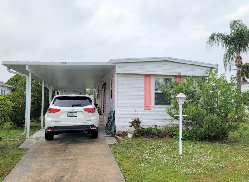 Nicely updated 1982 Single wide home that features 2 baths with - Beach Home for sale in Barefoot Bay, Florida on Beachhouse.com