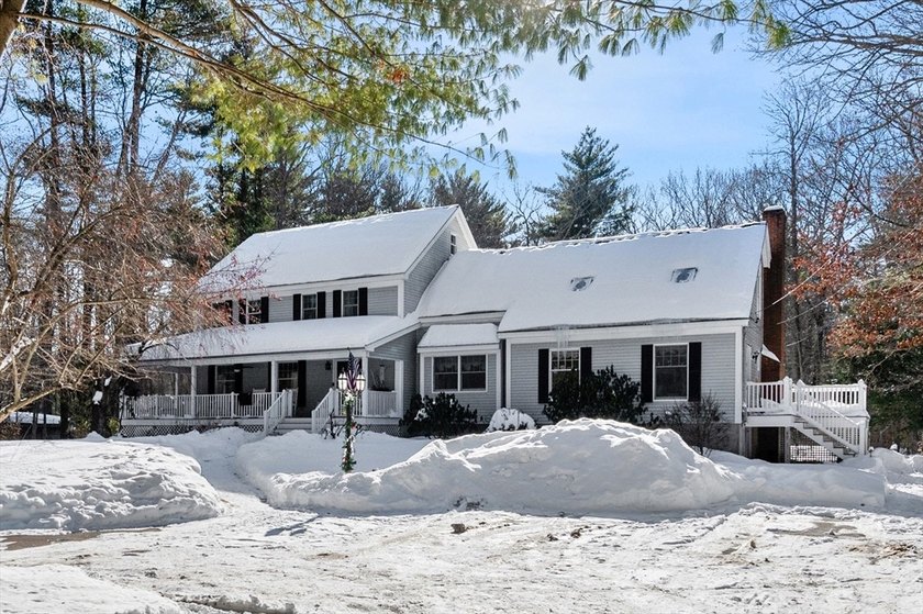 Set on a scenic 1.63 acre lot, this spacious Salisbury home with - Beach Home for sale in Salisbury, Massachusetts on Beachhouse.com