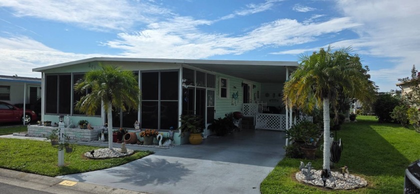 570 57th W. Lot 248  Bradenton FL 34207  Pescara Lake is a 55+ - Beach Home for sale in Bradenton, Florida on Beachhouse.com